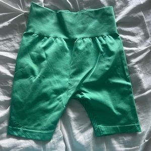 Green biker shorts